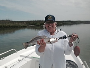 Dannie & Tony Marko whiting, sharks and seatrout fishing. Here's Dannie with a nice seatrout caught on a soft plastc.