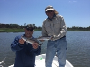 Dave & Tarver catching some reds and seatrout. Beautiful day!