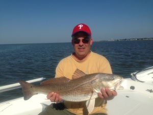 Phil Kriger with a large red drum