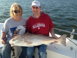 Brian Davalt & Trish Collins with a big red caught on dead shrimp! A near prefect day on the coast!