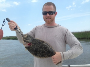 Corey Bowden catching flounder pitching jigs
