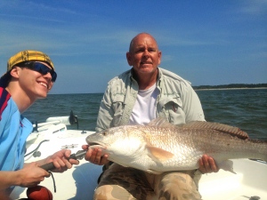 Richie Roberts and Capt. Jack with a large redfish Richie landed