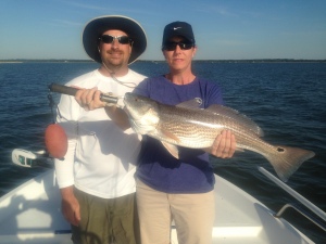 Brad Poplin and Carol with a large red!