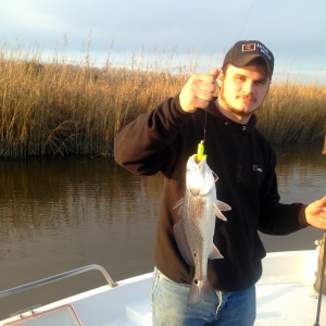 Jamie Brink catching a nice 17 inch schoolie redfish!