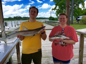 Andrew & Melissa Cox. Andrew is holding an atlantic sharpnose shark. Melissa is holding nice May seatrout! Spring time fishing!