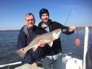 Derek Murphy and father in law catching some nice reds!