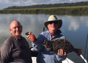 Carl Kotthemer is holding a 22 inch flounder! Vic, Norm & Carl of CCA Skidaway Chapter caught a variety of redfish, black drum & sea trout. Nice Catch!