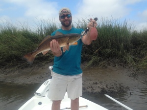 Chris with a nice red caught on 1/4 jig and live shrimp!