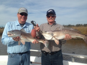 Steve and John Brooks doubling with a pair of over sized redfish!