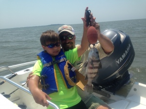 Michael & his dad John Michno with a chucky black drum! The boys caught several drum most a little shy of keeping size.