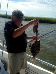 Doc & Joe Stahl catching the variety of fish! Doc is a nice flounder!