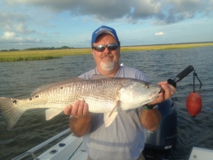 Kent with a 32 1/2 in. red! First redfish.