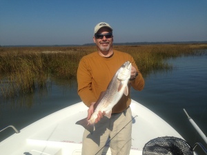 Alex Hill with a nice red! Pitching jerk worms on a big tide.