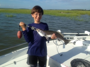 Ronny Kaplan's guest Jake with a 22 inch sea trout! Nice job Jake.