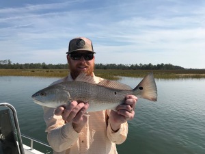 Andy and his wife catching and releasing some redfish and sea trout.