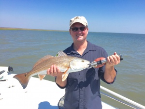 Adam Dwyer and Joe Barnes on a nice seatrout bite! Joe is holding redfish a little over 23".