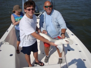 Matthew Bryant and Capt. Jack with an atlantic sharpnose. Shark'n!