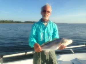 Ron Thomas taking a seldom morning off catching some nice seatrout and redfish with Capt. Jack