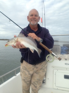 Capt. Jack with nice red on the fly
