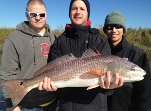 Marcus Ortman. Alexander Perkins and Lam Hoang with a large red! Dandy fish!