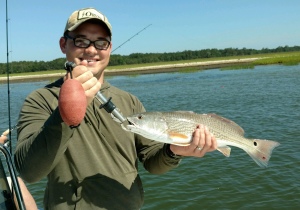 Dillon Till & father in law catching some nice sea trout. Dillon is holding a nice schoolie red.