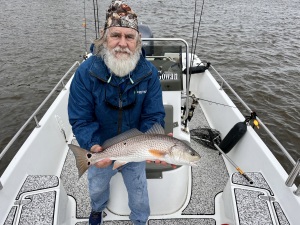 Capt. Jack with a redfish.