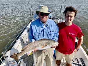 Gene Marshall & grandson Bill with a nice red!