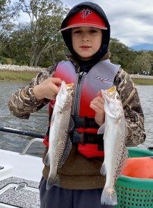 Brett Lee with a couple of nice trout on a slow day of fishing.