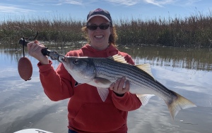 Christiana Kenney with a nice striper!