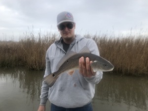 Adam with a nice winter time schoolie red.  Sid & Adam catching some winter redfish.
