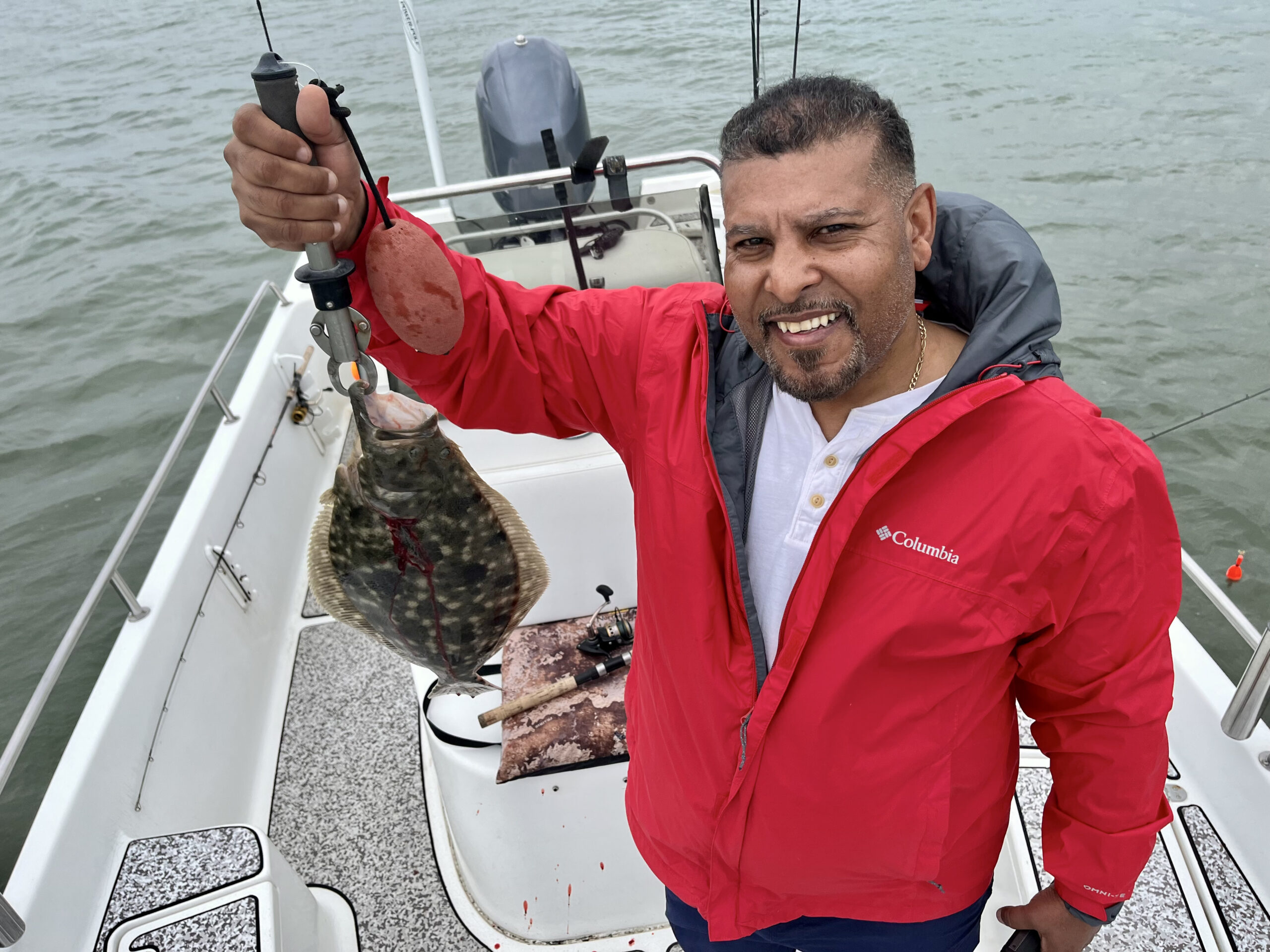 Jose Lombay with a nice flounder! Not a lot of fish but nice ones